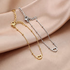 Armband bolletjes schakel met open hartje