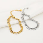 Muntjes armband - goud