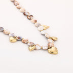 Kralen ketting met bedels - beige